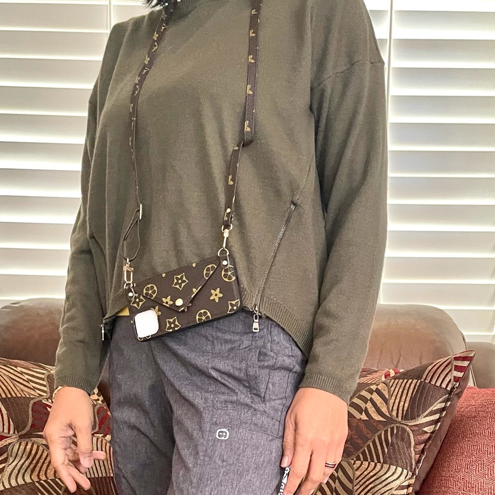 Cute crossbody IPhone 12 case with card slots, brand new but no tag.